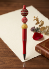 Red and Gold Sparkle Bead Pen
